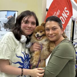 Termite the dog (398562) with adopters Teresa and Sloane at PetSmart Gresham