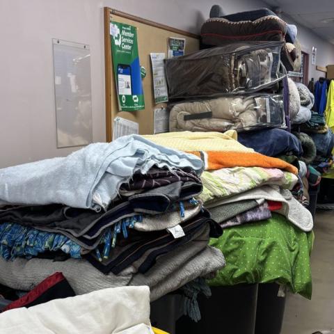 Blanket donations being sorted in the hallways of the shelter.