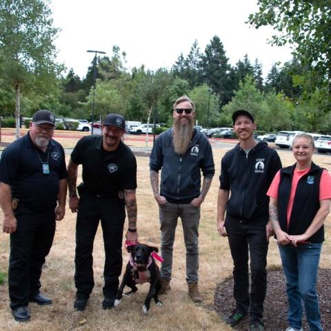 MCAS staff celebrate alongside Head Trainer, Terry Hartman, Washington Department of Corrections Officer Porter, and a newly graduated K-9 Penny after completing the 200-hour training. L to R - Terry Hartman, Officer Porter, K9- Penny, Jordan Buck, Caleb Taylor, Jodi Luffman.