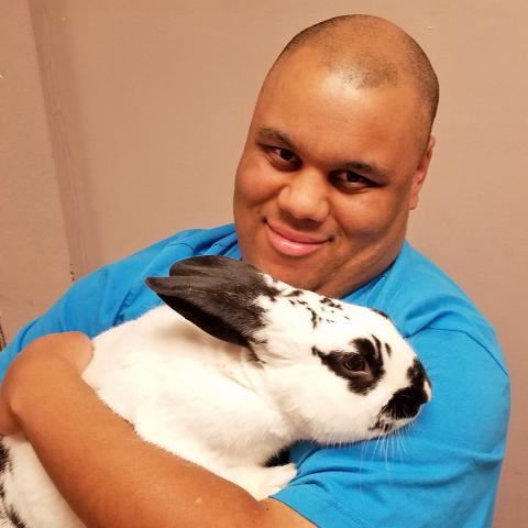Jesse M holding a rabbit